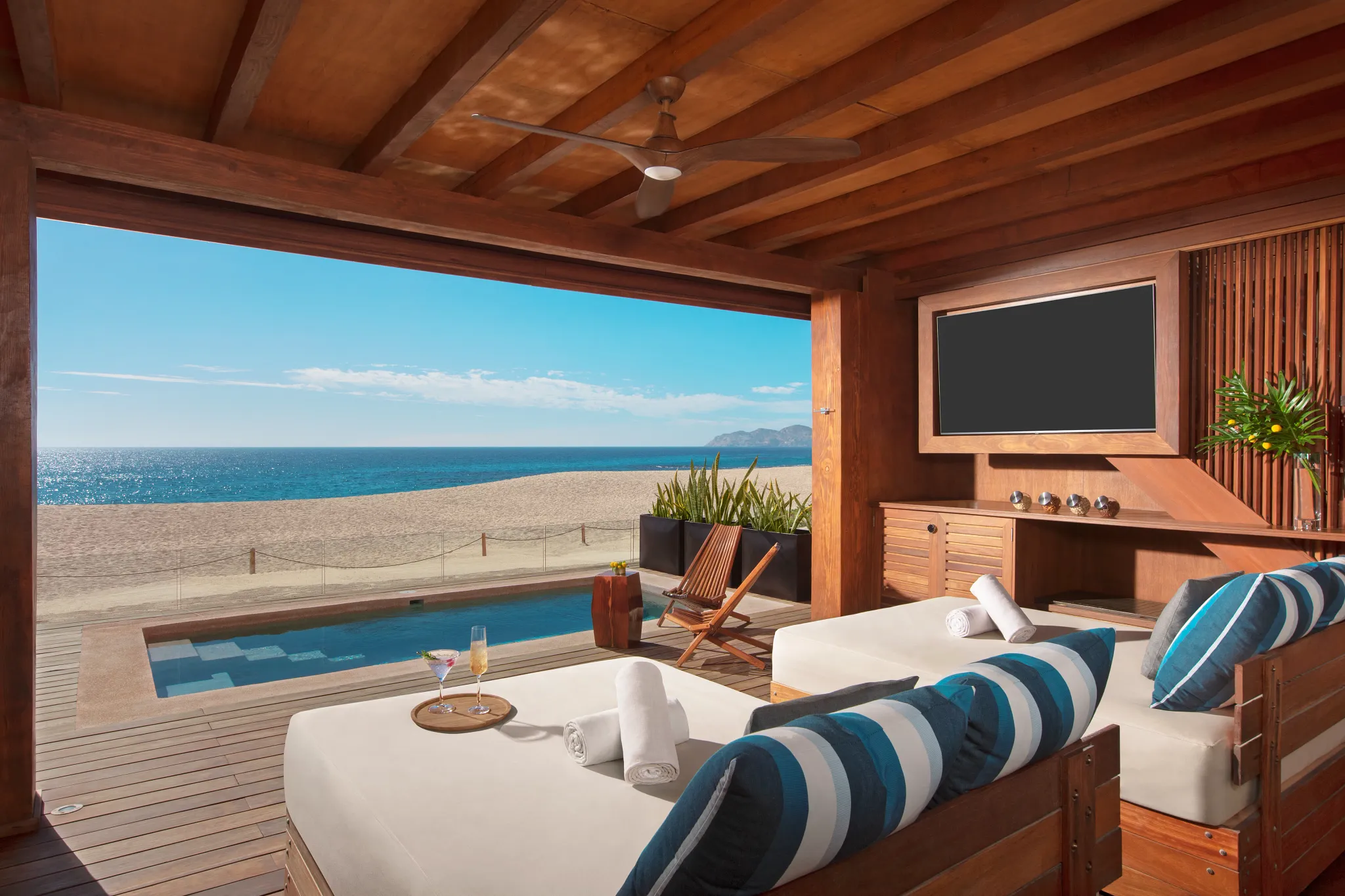 Luxury beach cabana suite with ocean views and private plunge pool at Dreams Los Cabos Suites Golf Resort & Spa.