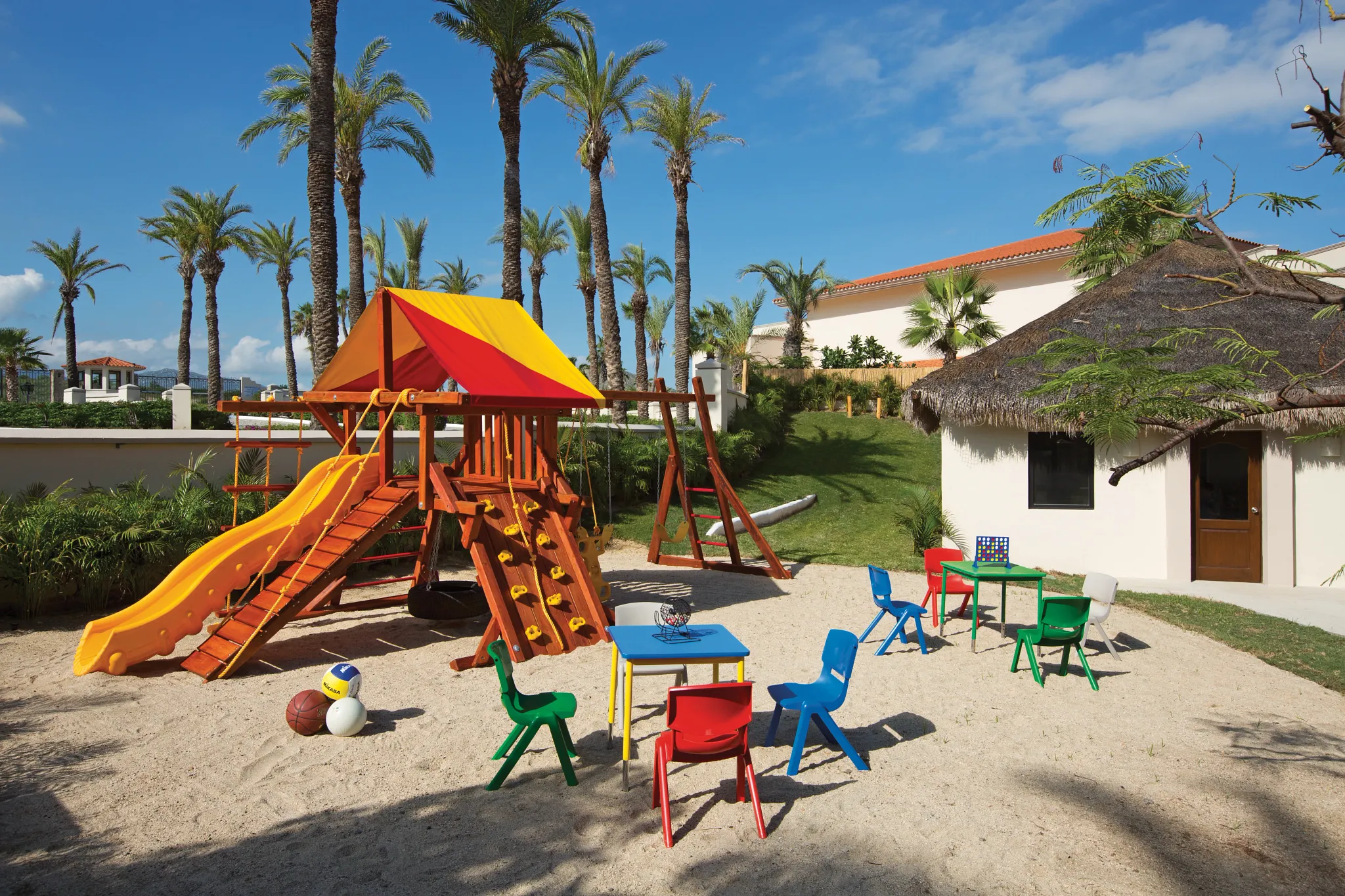 Outdoor playground and play area at the Explorer’s Club for Kids at Dreams Los Cabos Suites Golf Resort & Spa.